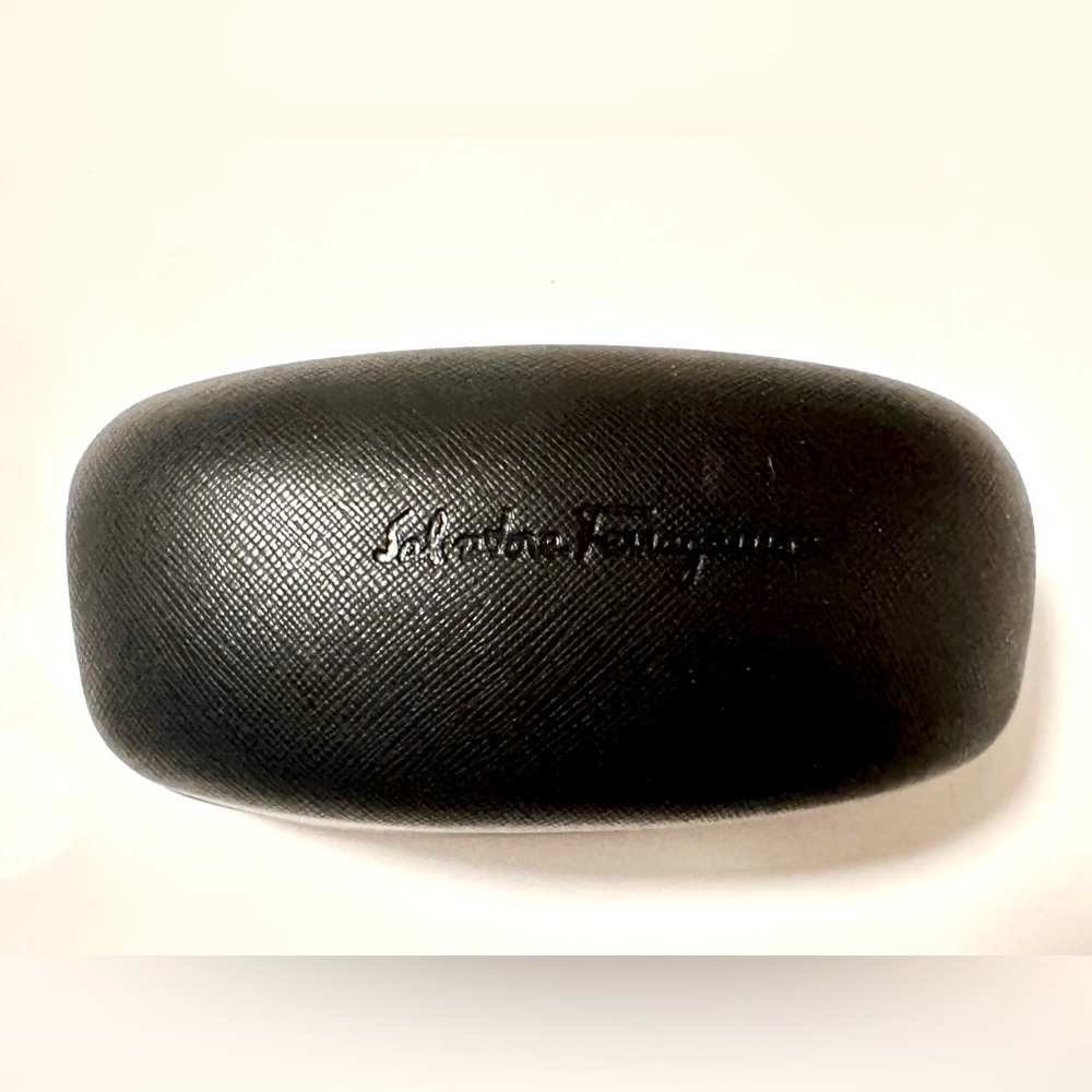 Brand new sunglasses case with unopened cleaning pad in original plastic wrap